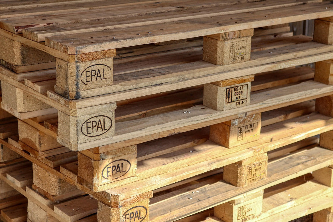Stacked wooden pallets for pallet certification and standards markings guide