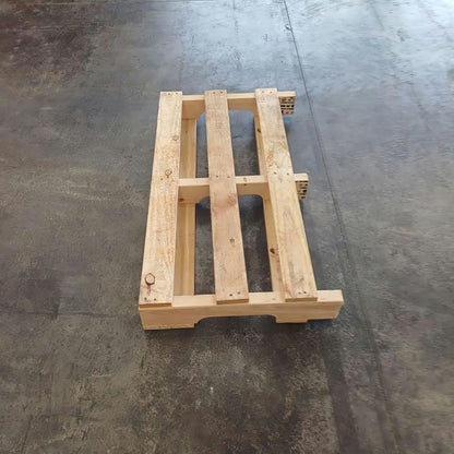 Wooden pallet on a concrete floor