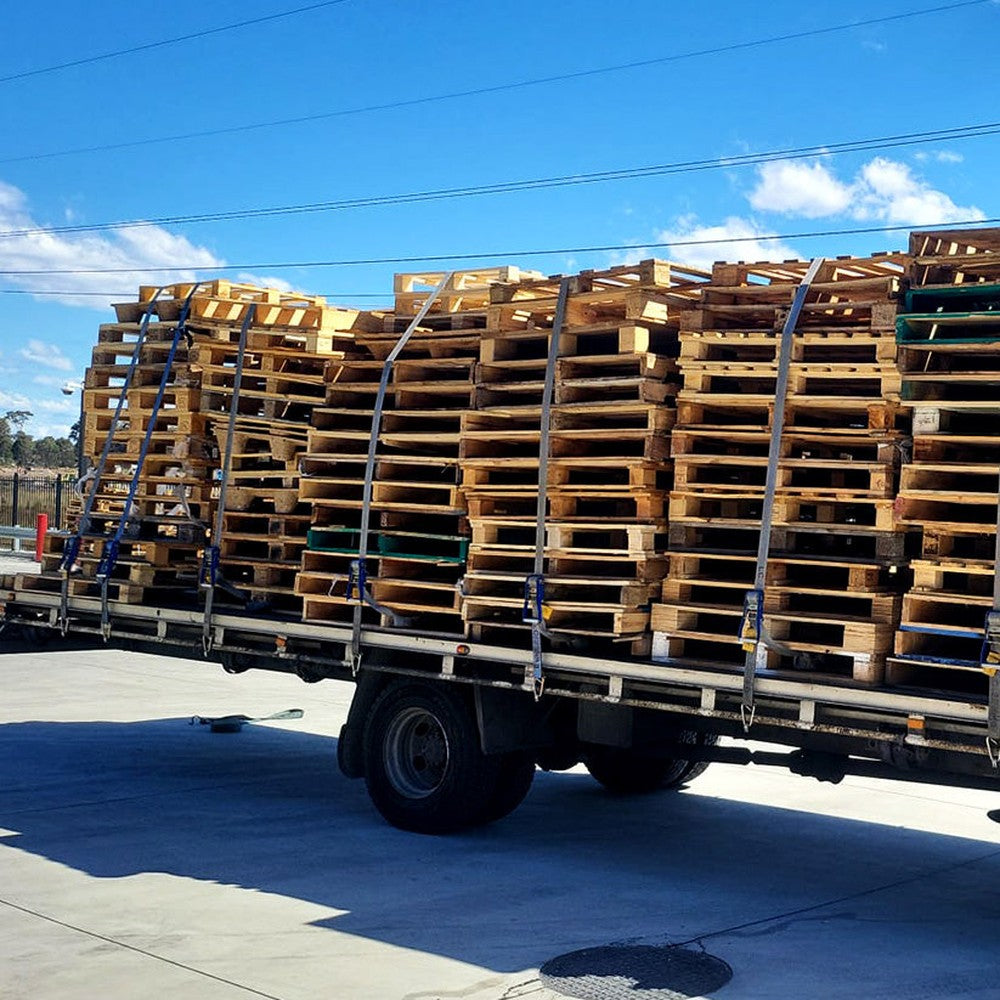 Freight pallets loaded on a tray truck