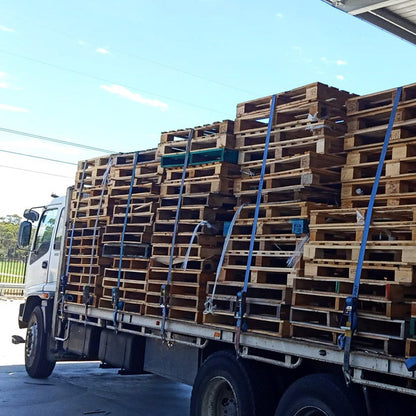 Freight pallets strapped on a truck