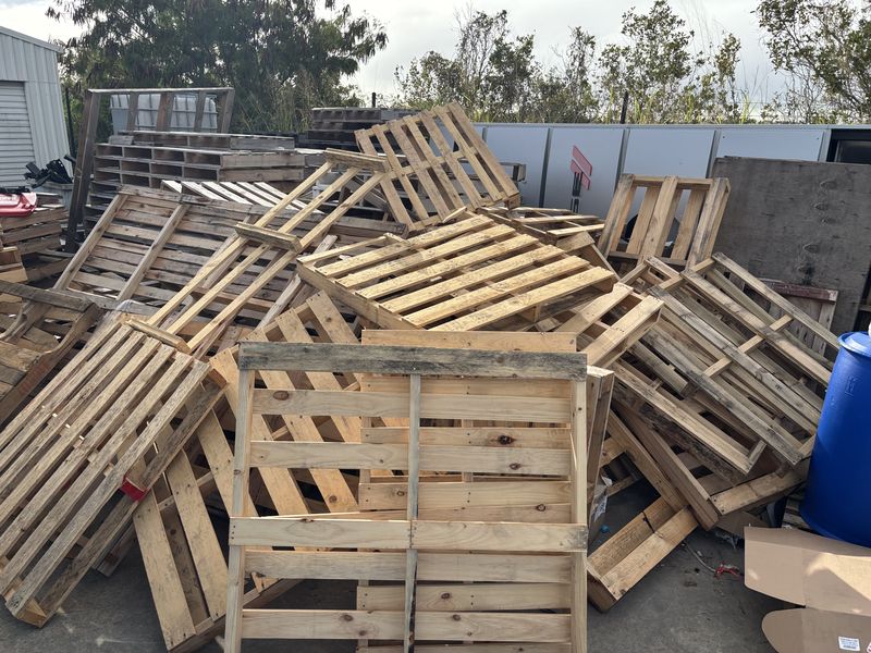 A pile of broken timber pallets